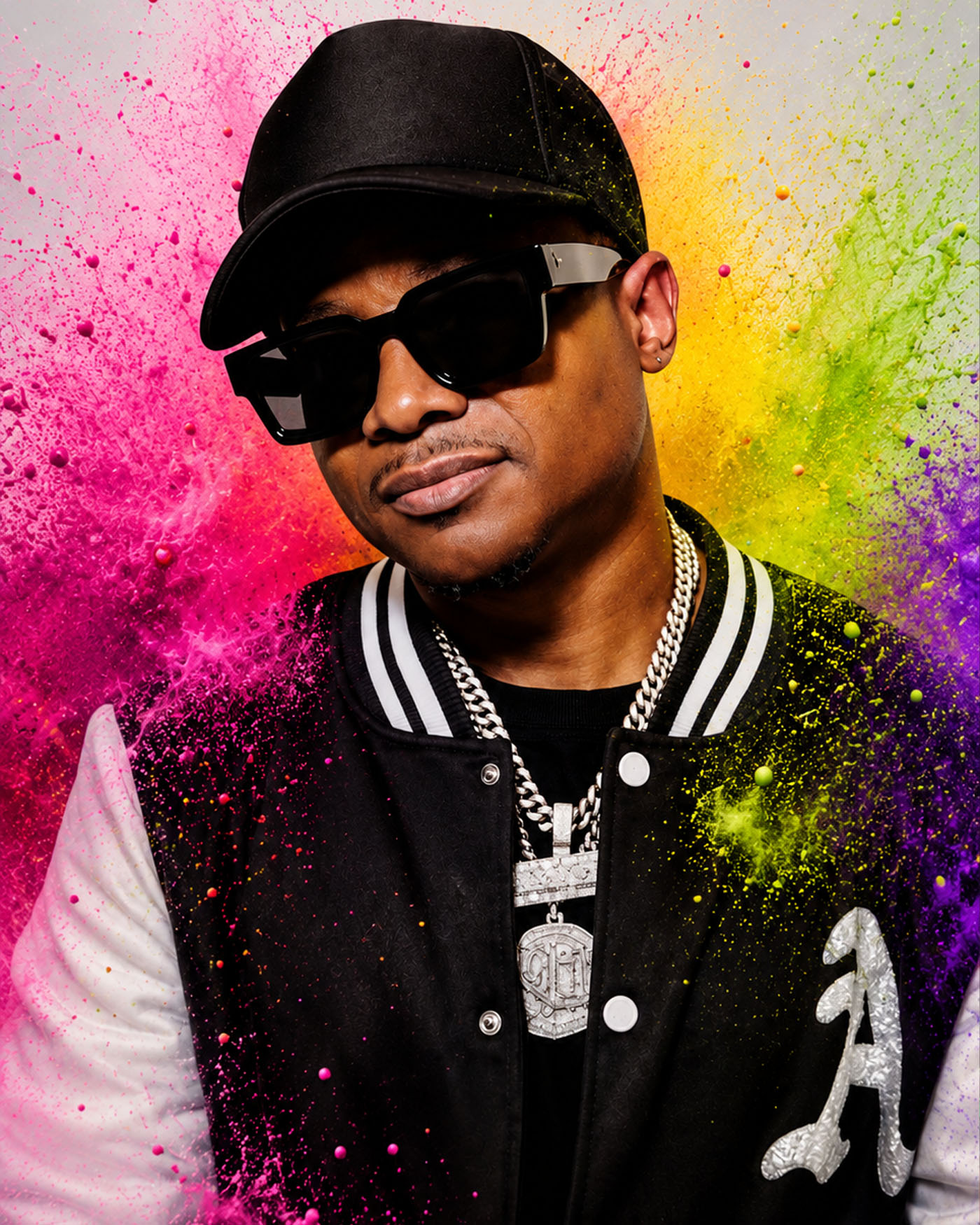 DJ Avalanche under hard flash, paint across the frame